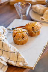 Muffins on modern marble serving board