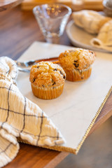 Muffins on modern marble serving board