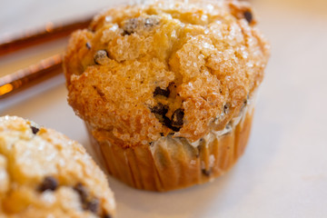 Muffins on modern marble serving board