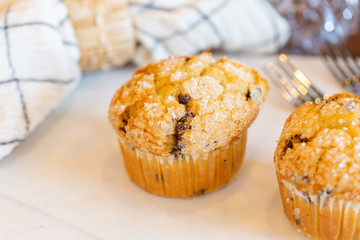 Muffins on modern marble serving board