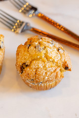 Muffins on modern marble serving board