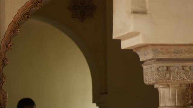 Detail of Nasrid arc and chapiter column in the Alcazaba, Malaga, Spain