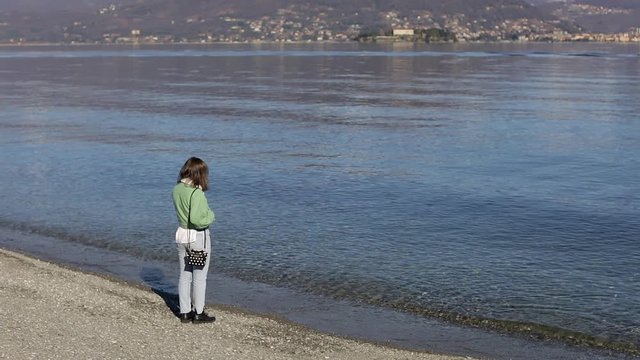 Pretty Girl Walking To Lake. Enjoying The View.