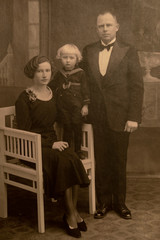 LATVIA- CIRCA 1925- 1930: Shot of married couple and their child in studio, Vintage Carte de Viste...