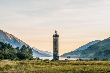Glenfinnan Monument with clouds at sunrise