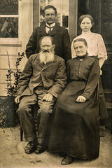 RUSSIA - CIRCA 1905-1910: Shot of elderly married couple with their adult son and daughter in...