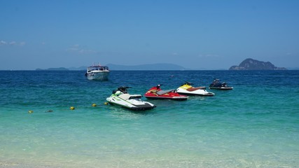 Fototapeta premium colourful jet skis in the ocean