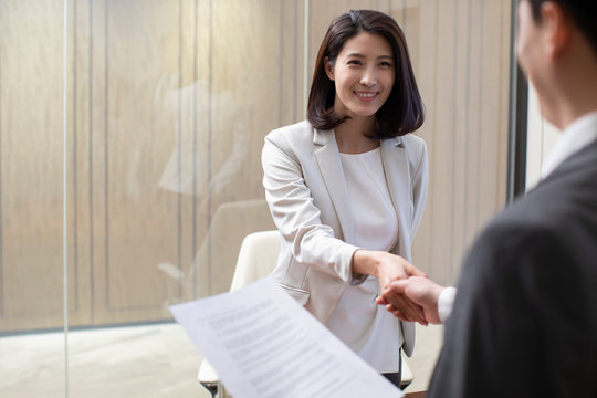 Young Chinese businesswoman in job interview
