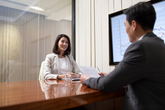 Young Chinese businesswoman in job interview
