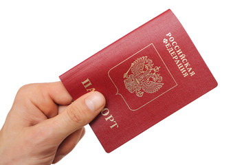 Russian foreign passport in the hand isolated on white background