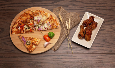 pizza and wings flatlay - 324379597