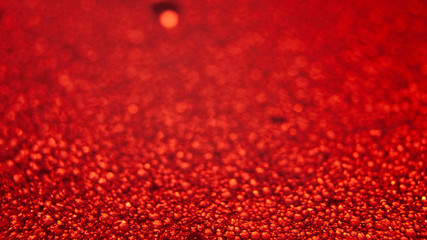 Water drops texture on red background