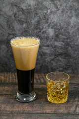 Stout Beer and glass of Whiskey in Pub
