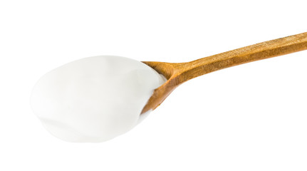 White Yogurt on Wooden Spoon