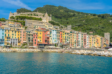 Fototapeta na wymiar Portovenere in Cinque Terre, Italy, view at the town from mountain trail