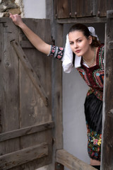 Beautiful slovak woman in traditional costume. Slovak folklore.