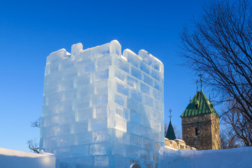 Fototapeta premium Tower build with ice cube bricks in Quebec city