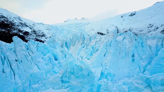 4k Aerial of big blue ice glacier
