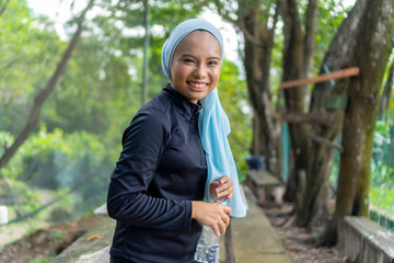 Portrait of Malay Muslim lady wearing hijab outdoor