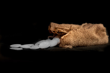 sack with the thirty silver coins biblical symbol of the betrayal of judas