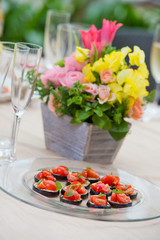 Food and flowers at a banquet or wedding reception celebration