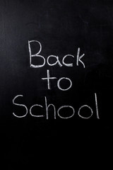 Back to School written in chalk on chalkboard