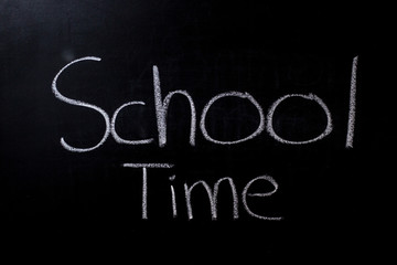 School Time written in chalk on a chalkboard