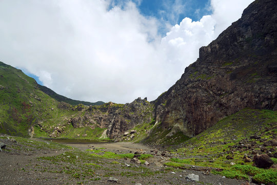 Panorama volcanic landscape of green Caldera Kaba volcano crater in Rejang Lebong, Bengkulu, Indonesia.