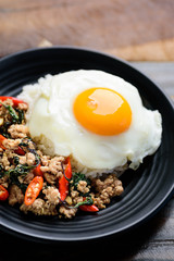 Thai food (Pad Kaprao Moo Kai Dao), stir-fried holy basil with minced pork and fried egg	