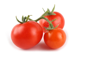 Red cherry tomatoes isolated on white