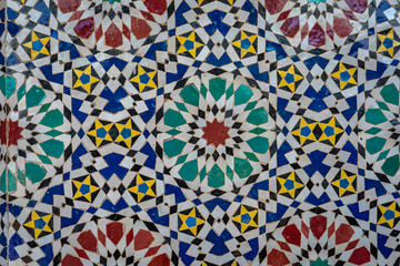 Multi-colored ornamental wall mosaic in Morocco