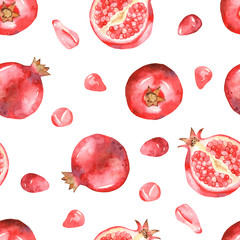 Watercolor seamless pattern of pomegranates, halves of pomegranates on a white background