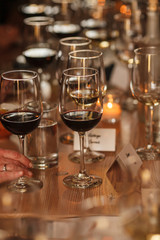 Red wine glasses on a table.