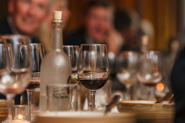 Red wine glasses on a table.