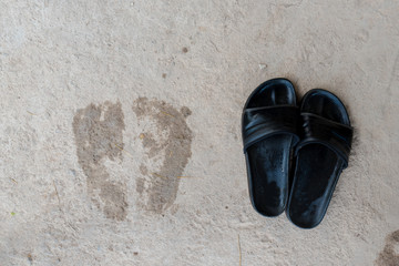 Slippers on the cement floor