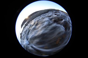 River flows into the sea. Northern circular fisheye landscape