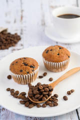 Banana cupcakes mixed with chocolate chip on a white plate.