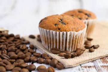 Banana cupcakes mixed with chocolate chip on a white plate.