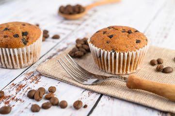Banana cupcakes mixed with chocolate chip on a white plate.