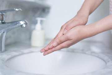 Hand features of Asian women washing their hands