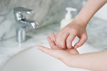 Hand features of Asian women washing their hands