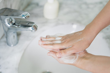 Hand features of Asian women washing their hands