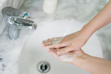 Hand features of Asian women washing their hands