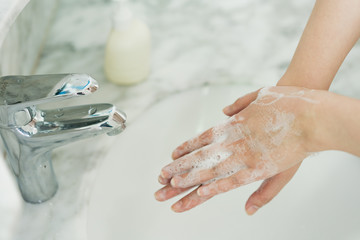 Hand features of Asian women washing their hands