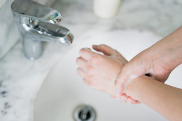 Hand features of Asian women washing their hands