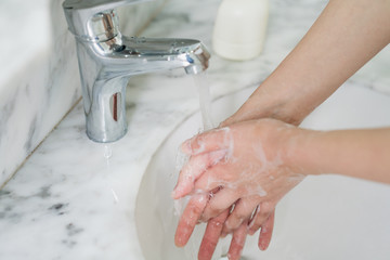 Hand features of Asian women washing their hands