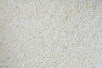 top view of raw dry rice,thai jasmine rice 100% texture background for product