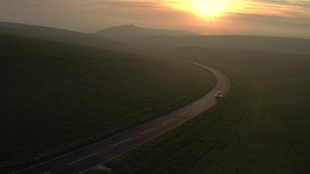 Tesla Model S static drone/ aerial shot sunset.