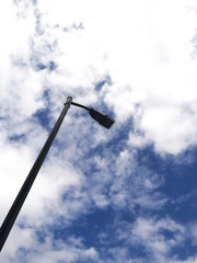 Lamppost blue sky and clouds