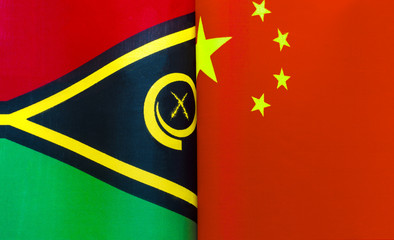 fragments of the national flags of the Republic of Vanuatu and China in close-up